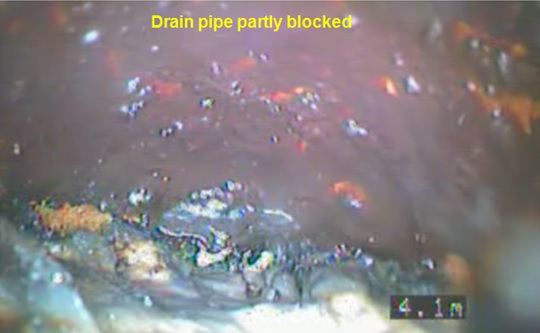 Drain pipe partly blocked